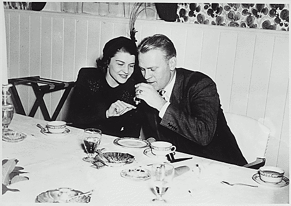 H0038-2. Gerald R. Ford, Jr., and Betty Bloomer Warren at their wedding rehearsal dinner, Grand Rapids, MI. October 14, 1948.