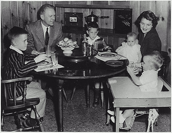 H0042-3. Gerald R. Ford, Jr., Betty Ford, and their children Mike, Jack, Susan, and Steve sit in the dining room of the Ford residence at 514 Crown View Drive, Alexandria, VA. 1958.