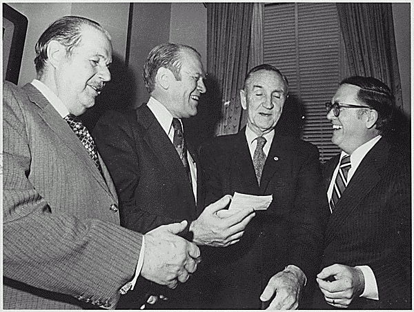 049-1. Vice President Gerald R. Ford jokes with Senate Minority Leader Hugh Scott (PA), Majority Leader Mike Mansfield (MT), and Senator Robert Griffin (MI). 1974.