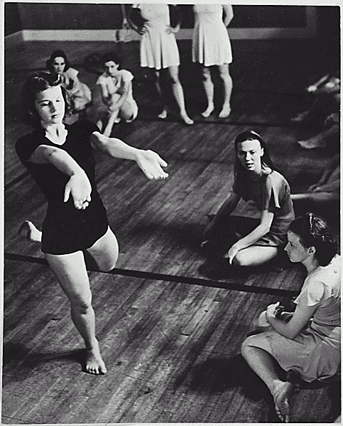 H0069-1. Betty Bloomer (front left) in a Bennington College Summer School of the Dance class taught by Martha Hill (right center). Bennington, Vermont. 1937.
