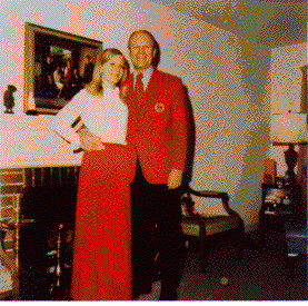 H0072-4. Susan Ford poses with Gerald R. Ford for a Christmas portrait in front of the fireplace in the living room of the family residence at 514 Crown View Drive, Alexandria, VA. December 1972.